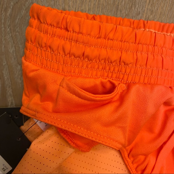 NIKE Women’s Standard Dri-FIT Mesh Running Shorts - Picture 9 of 13